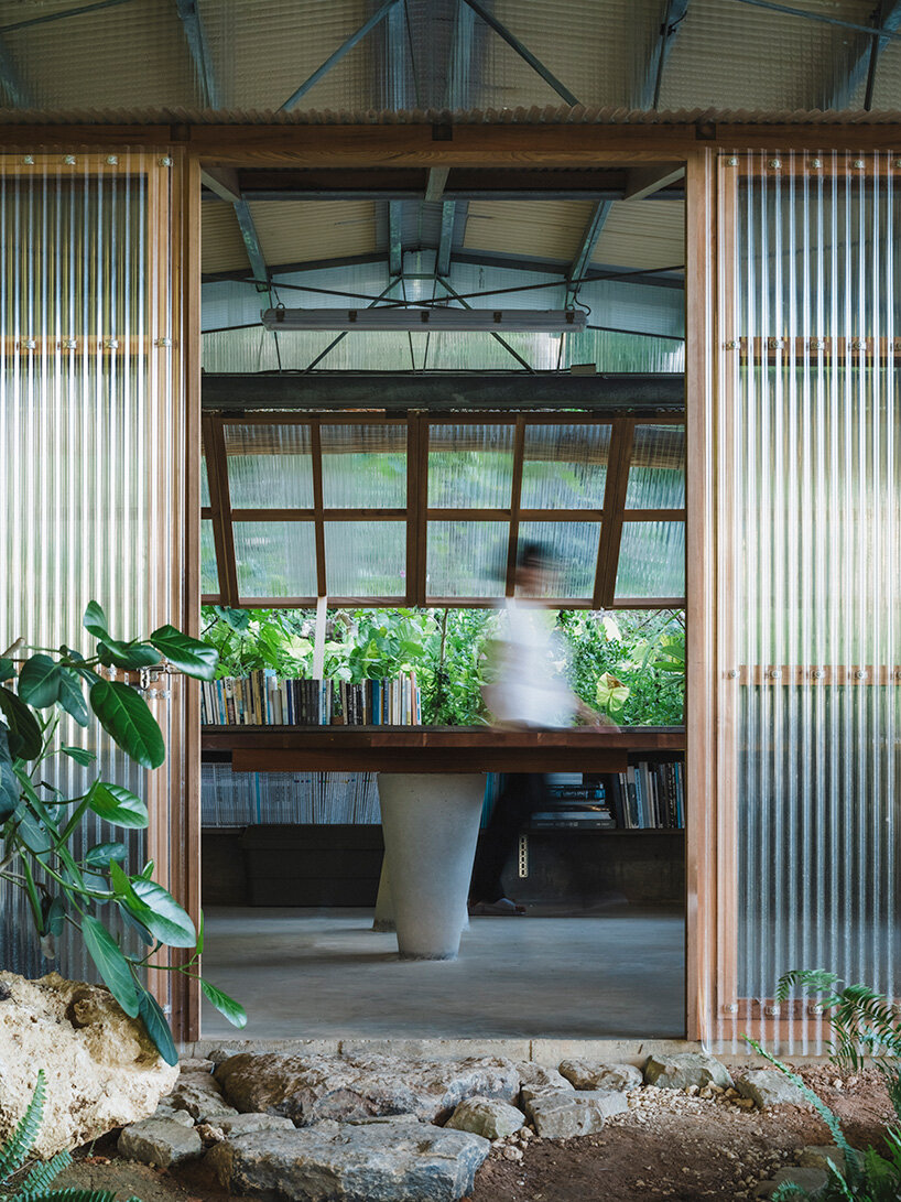 studio cochi architects wraps okinawa workspace in double-skin of insect netting and vinyl