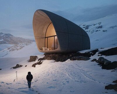 high-altitude cottage emerges like a rock from georgian mountains
