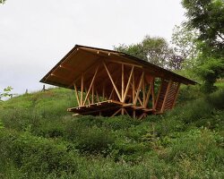 gabled timber observation pavilion promotes agroforestry in asturias, spain