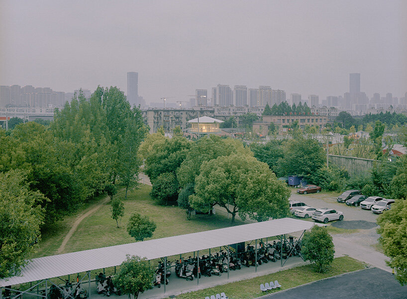 tiny 24-hour bookstore by SZ-architects crowns former prison watchtower in china