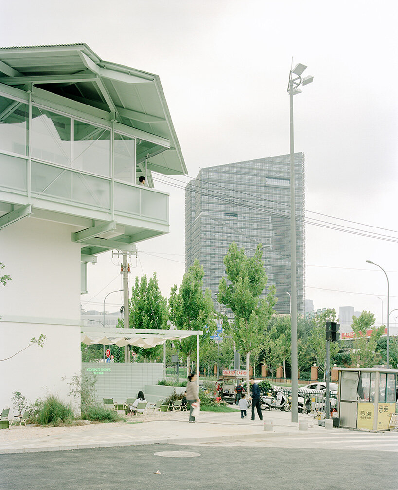 tiny 24-hour bookstore by SZ-architects crowns former prison watchtower in china