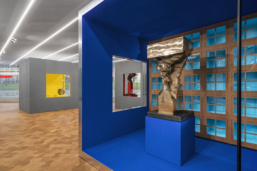 aldo rossi's furnishings for unifor meet francesco somaini's 1970s sculptures in milan