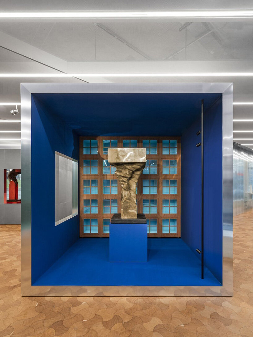aldo rossi's furnishings for unifor meet francesco somaini's 1970s sculptures in milan