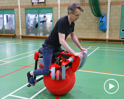 bike with one multi-directional ball rolls the riders to where they lean
