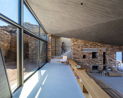biris-tsiraki architects sculpts greek summerhouse like an ancient ruin on antiparos