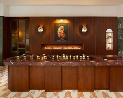 cathedral glass partitions pay homage to local architecture in milan's satinine perfume store