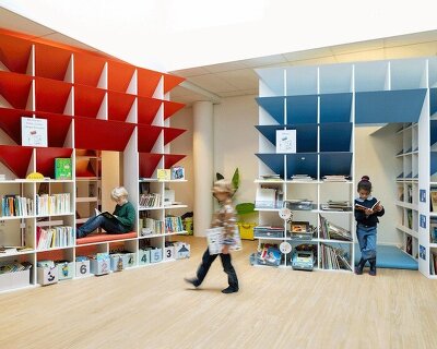 children can get lost in reading village full of colorful huts at transformed paris school library