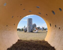 concrete utopia transforms discarded construction pipes into playground in south korea