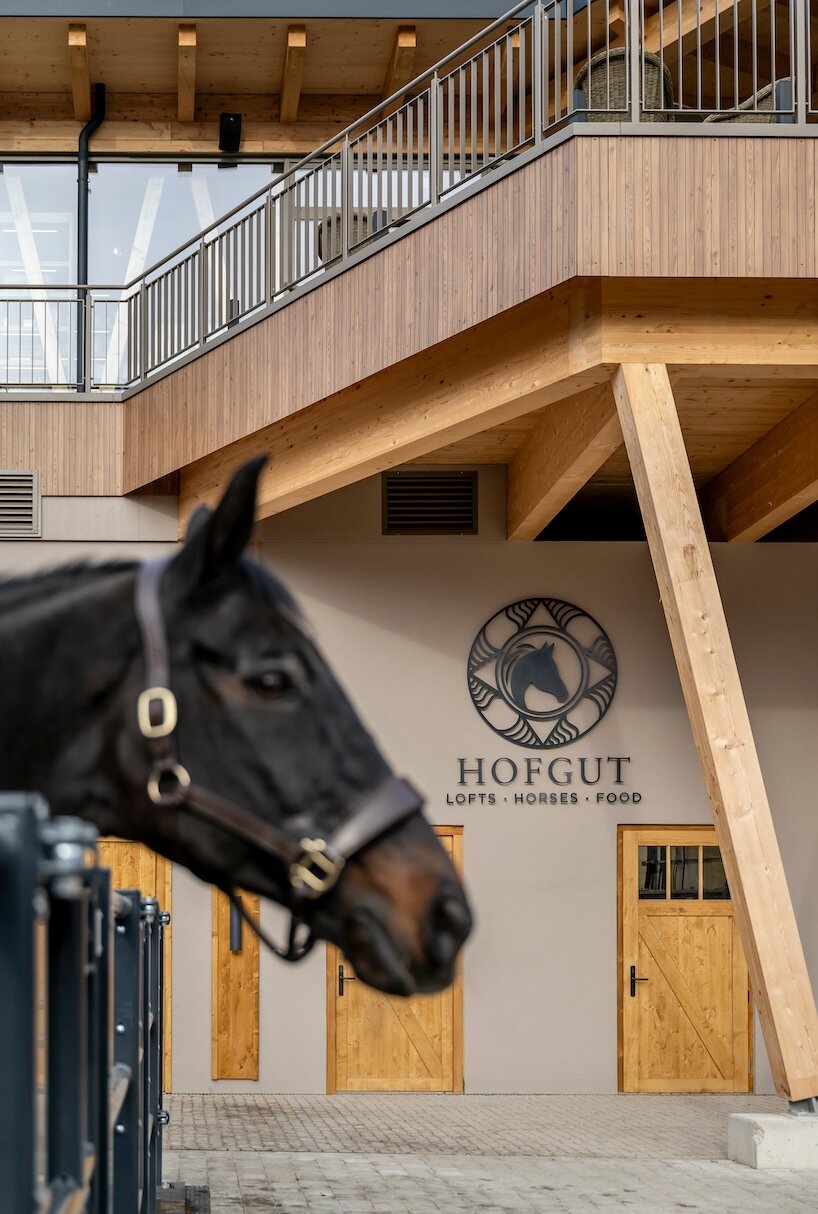 curved cabins show off 180 degree mountain view at sonnenalp resort in southern germany