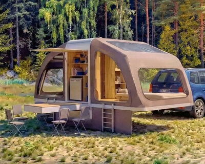 foldable tent box transforms from a wooden cabinet into a wing-like mobile shelter