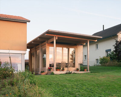 timber garden folly pavilion transitions between resting shelter and planted patio