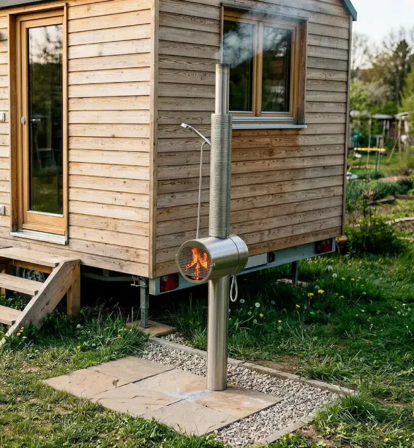 the wood stove lies in the middle of the frame