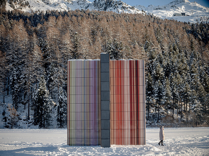 glazed color bands rise as sculptural tower in gerhard richter's alpine installation