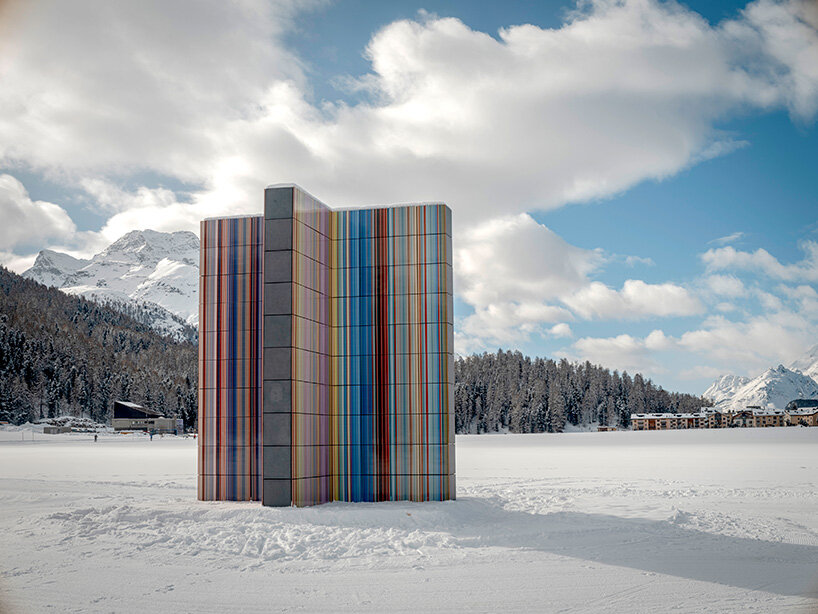glazed color bands rise as sculptural tower in gerhard richter's alpine installation