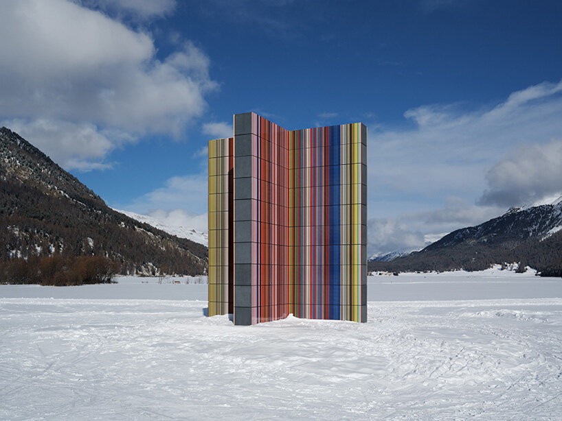 glazed color bands rise as sculptural tower in gerhard richter's alpine installation