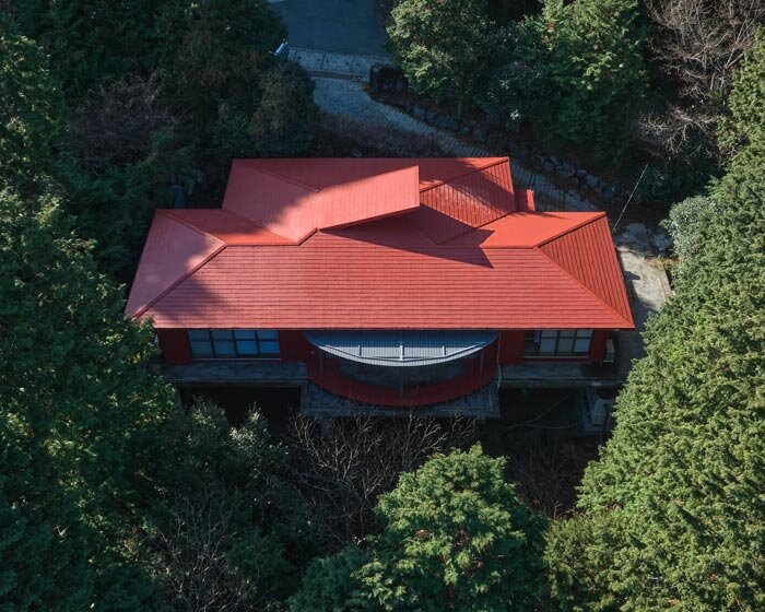 elevated circular veranda and canopy wrap 60-year-old restored japanese house