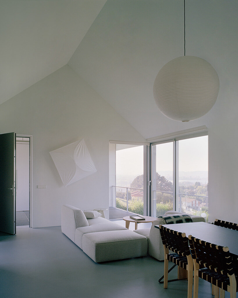 HANGHAR assembles steel-framed prefab residence in 48 hours on sloped spanish plot