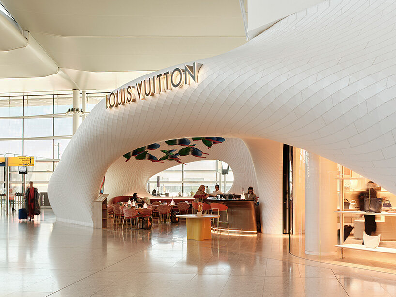 marc fornes / THEVERYMANY lands fuselage-like louis vuitton caf&eacute; and store at heathrow