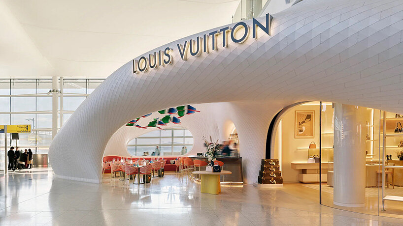 marc fornes / THEVERYMANY lands fuselage-like louis vuitton caf&eacute; and store at heathrow