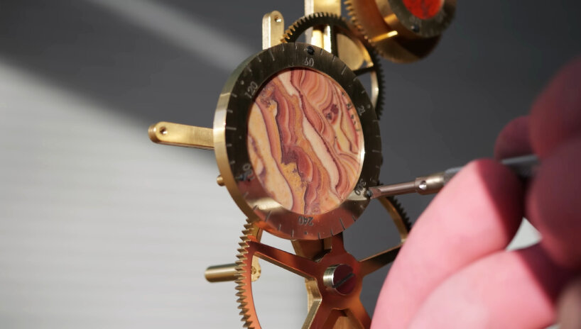 mechanical clock time planets