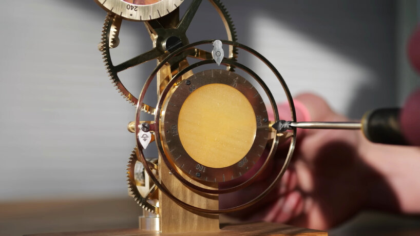 mechanical clock time planets