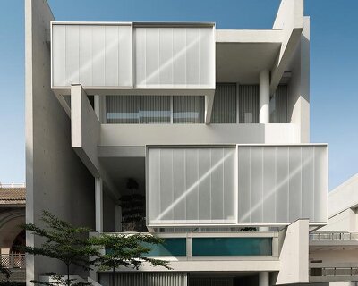 an interplay of restrained volumes and voids composes residence_bb 214 in india