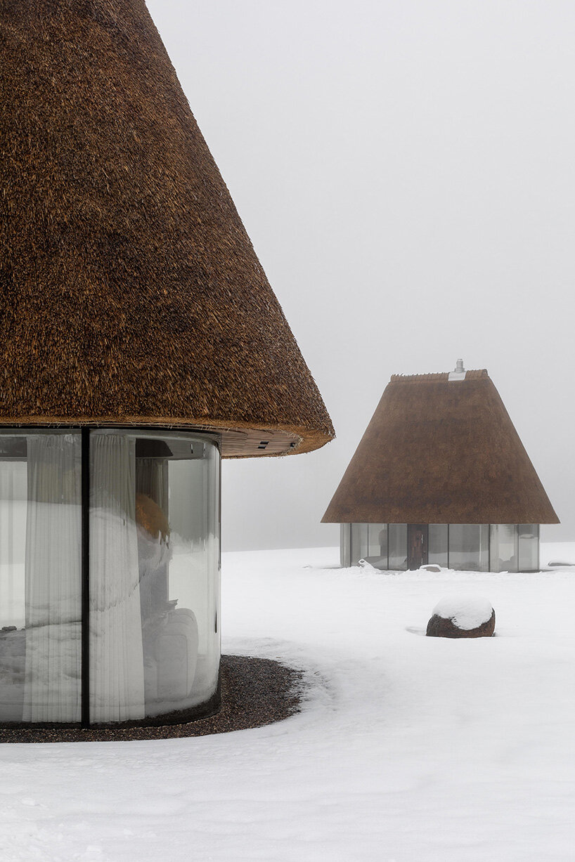 oversized reed roofs reinterpret the ukrainian mazanka in YOD group's guesthouses