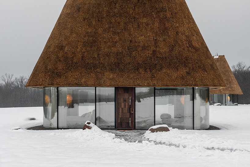 oversized reed roofs reinterpret the ukrainian mazanka in YOD group's guesthouses