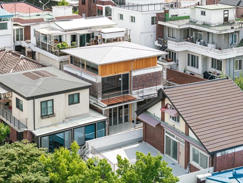 reclaimed brick skin and wooden frame update 1969 seoul residence