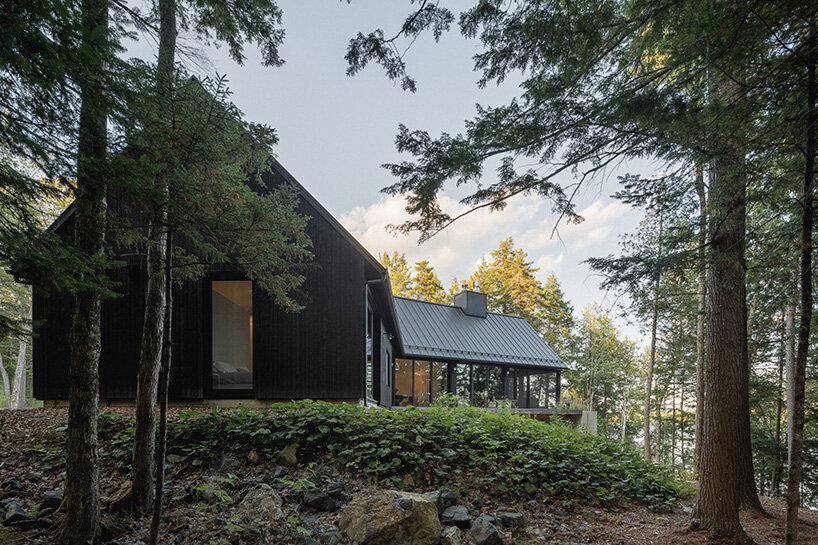 paul bernier architecte fragments residence on quebec's lake brompton into three wings
