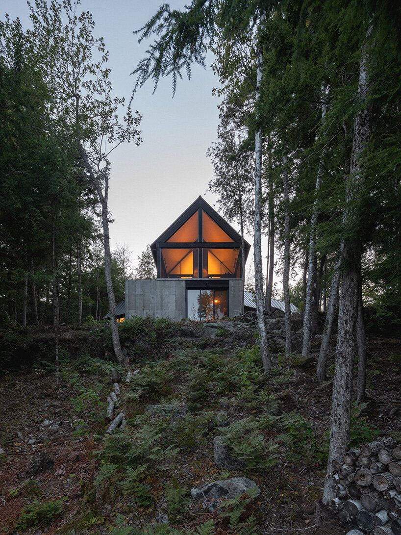 paul bernier architecte fragments residence on quebec's lake brompton into three wings