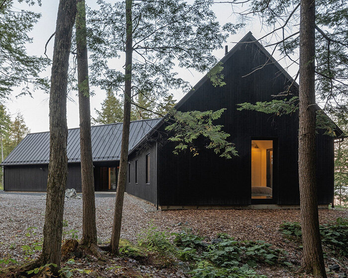 paul bernier architecte fragments residence on quebec's lake brompton into three wings