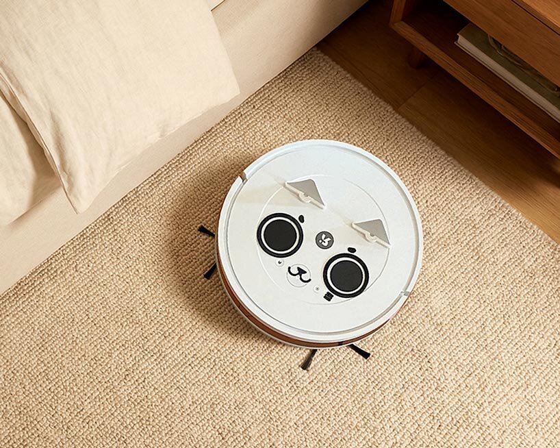 folding ears and face decorations turn robotic vacuum cleaners into small pet helpers