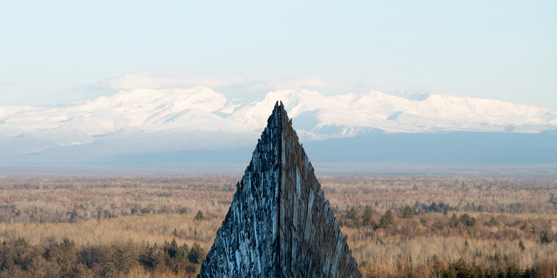 prism-shelter-viewing-pavilion-space10-studio-changbai-mountain-optical-installation-reflective-red-chamber-charred-wood-shell-designboom-1800-2