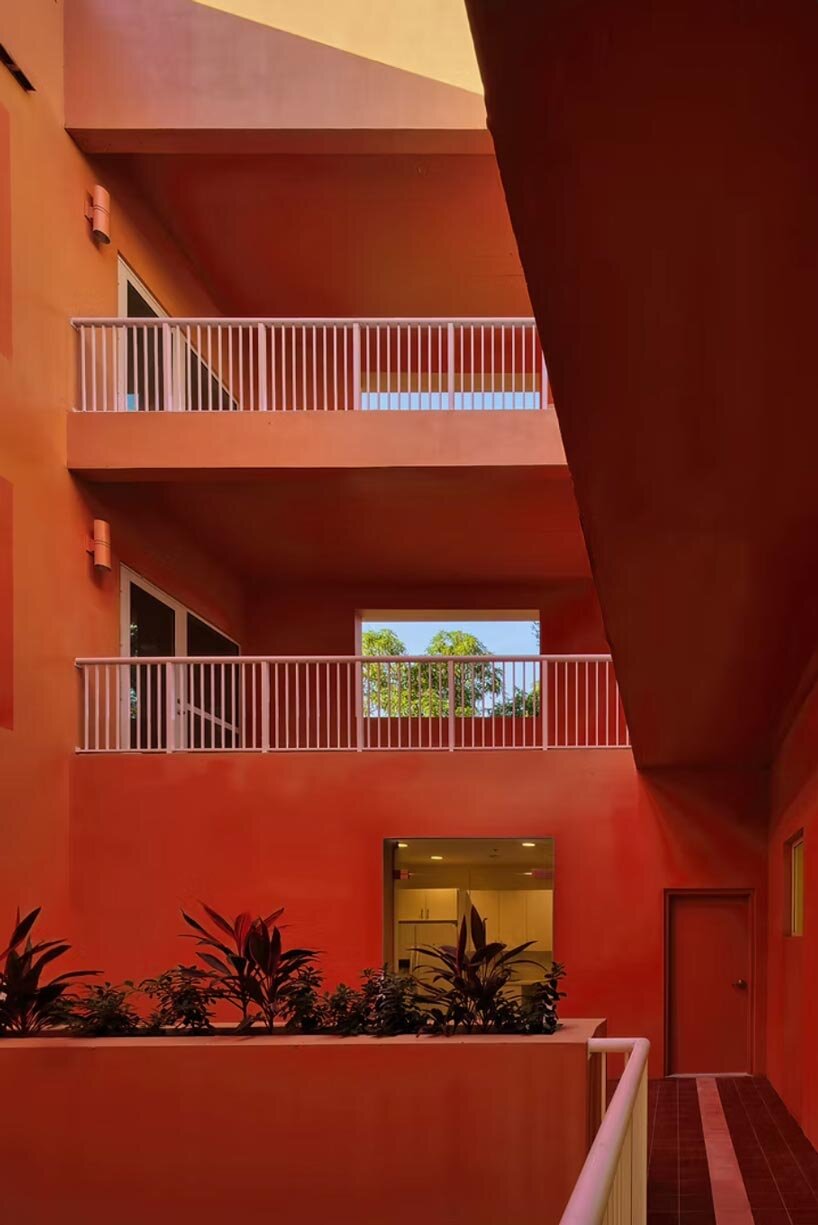 gridded peach residential facade rethinks affordable housing in miami