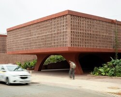 cast in red-pigmented concrete, la cacaotera museum celebrates cacao heritage in mexico