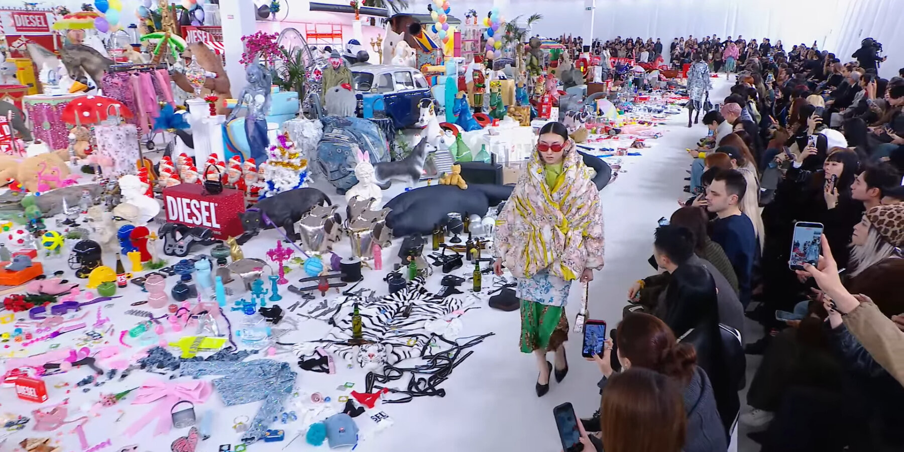 repurposed-props-inflatables-memorabilia-diesel-runway-show-milan-FW26-designboom-ban