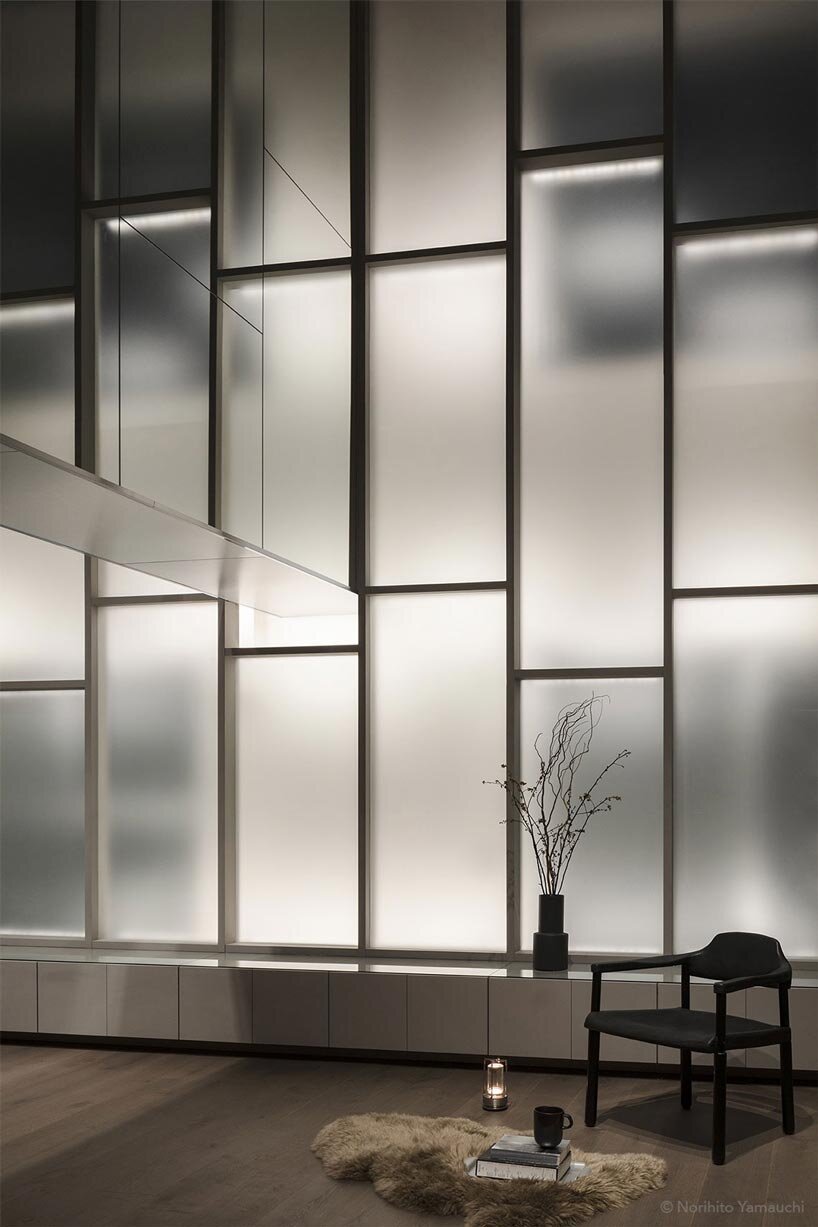 geometric frosted glass screens filter daylight within renovated room 1101 osaka apartment