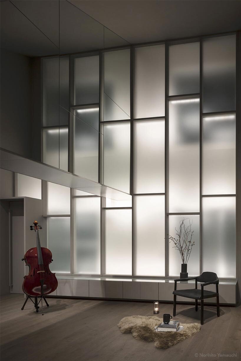 geometric frosted glass screens filter daylight within renovated room 1101 osaka apartment