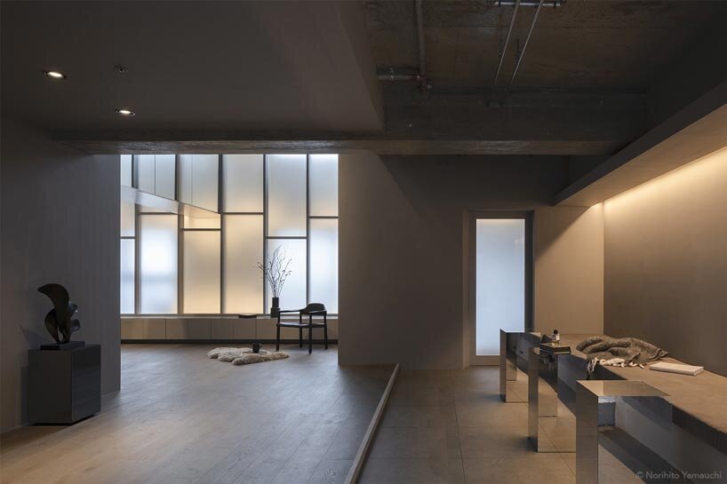 geometric frosted glass screens filter daylight within renovated room 1101 osaka apartment