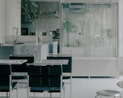 stainless steel and concrete build futuristic backdrop for tbilisi flower shop and cafe