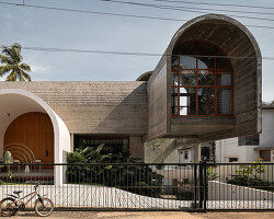 encasa archstudio shapes a tropical house with four interlocking concrete vaults