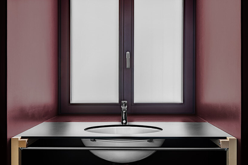 yellow diamond windows pierce angular concrete staff house by bergmeisterwolf in italy