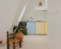 acte deux unifies parisian 'maids' rooms' into 55-square-meter attic apartment