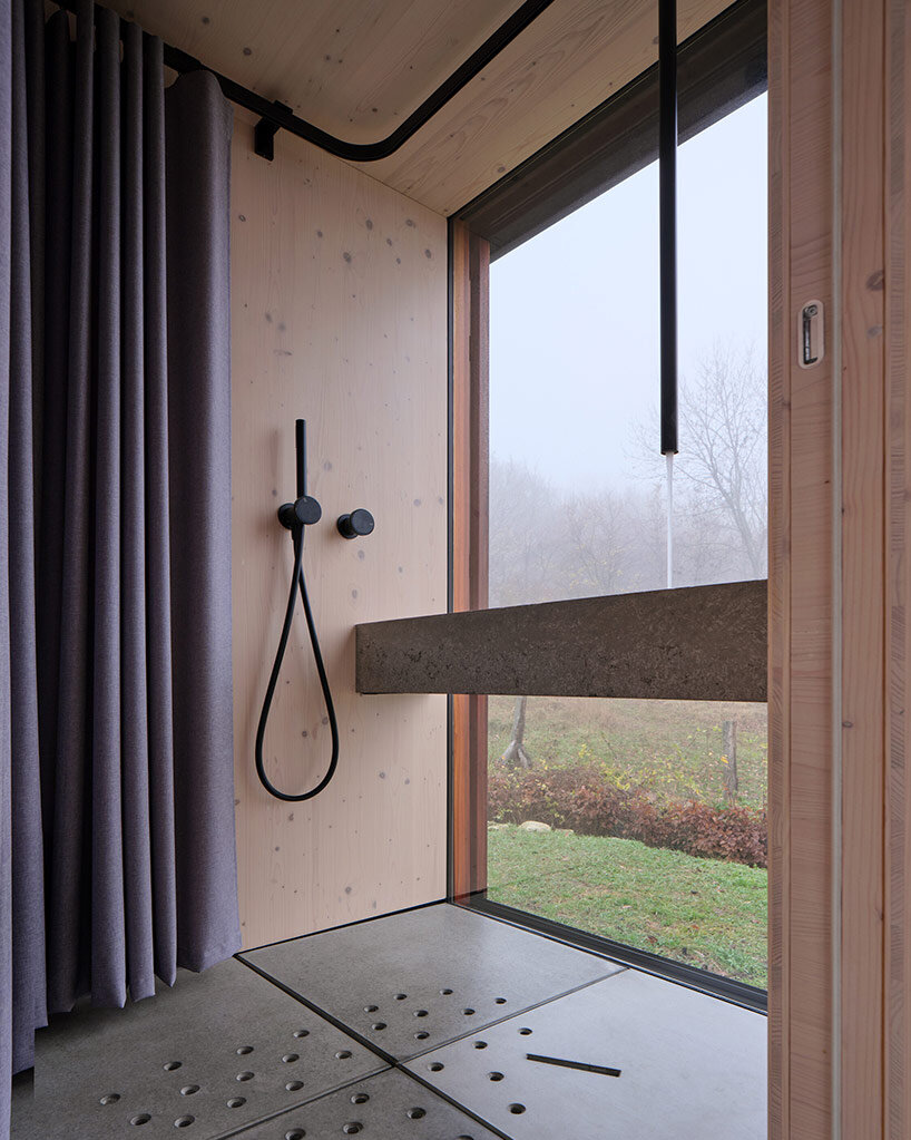 ark-shelter & archekta craft off-grid cabin with a fold-down facade in dev&iacute;n, slovakia - 1