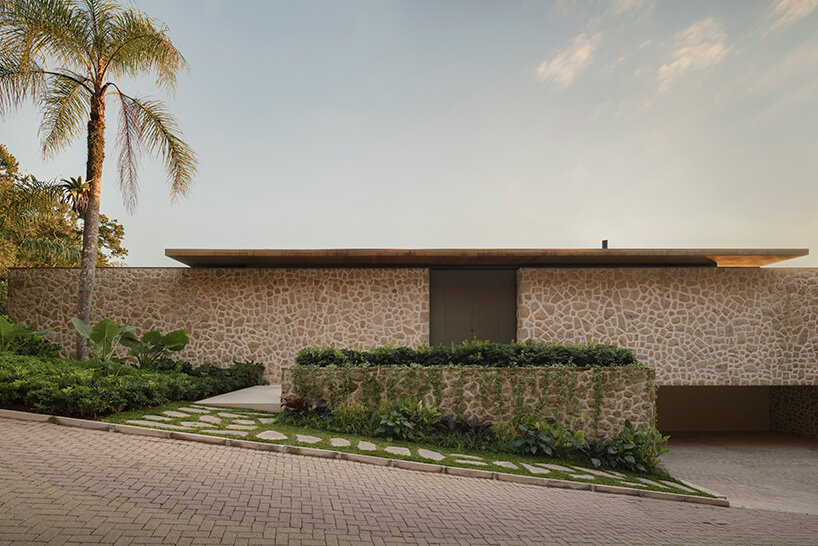 arthur casas adapts speculative structure into wood-lined coastal house in brazil - 6