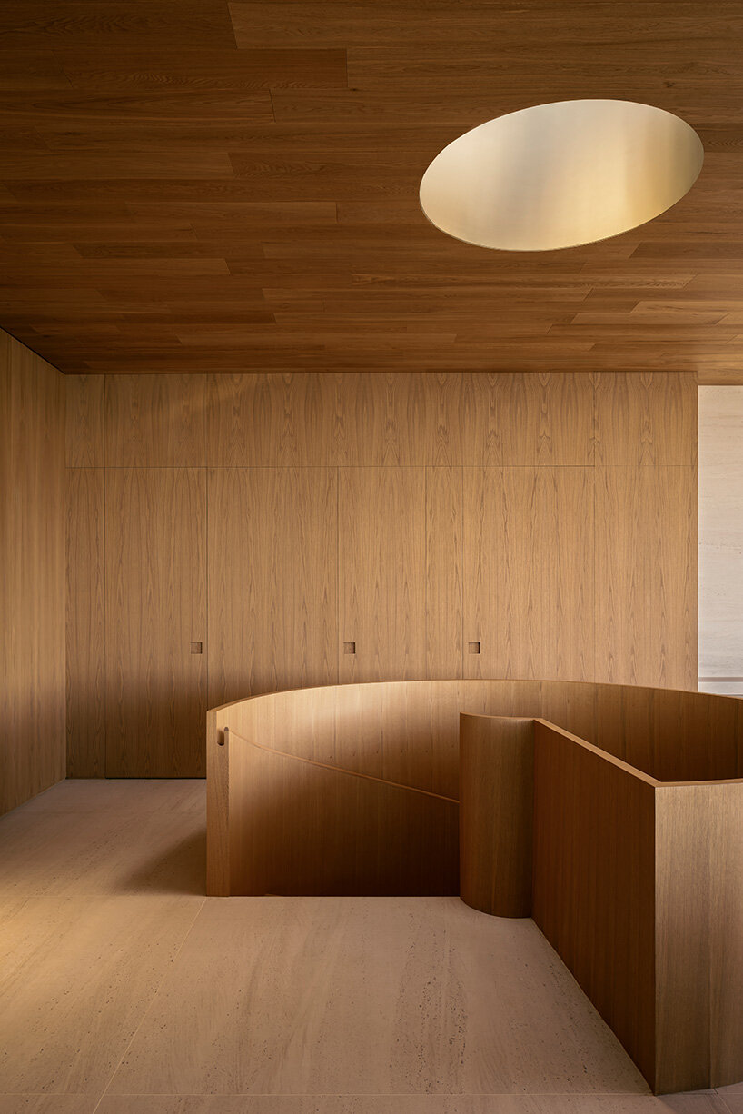 arthur casas adapts speculative structure into wood-lined coastal house in brazil - 11