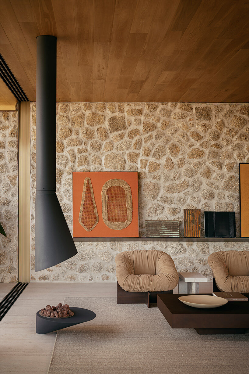 arthur casas adapts speculative structure into wood-lined coastal house in brazil - 12