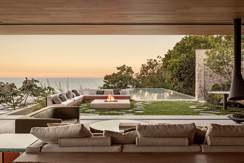 arthur casas adapts speculative structure into wood-lined coastal house in brazil - 8