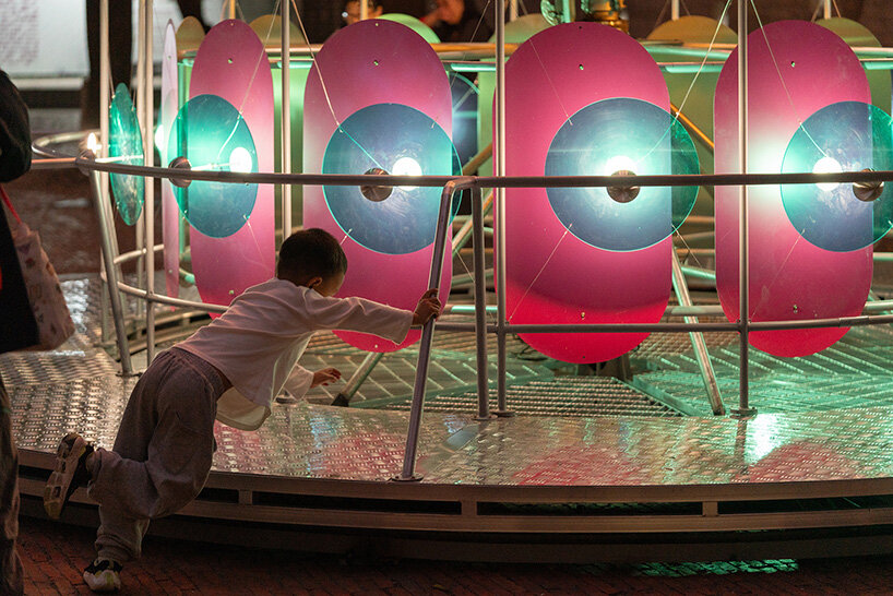 cake-like layers stack into a shared motion installation in china, bringing strangers into sync - 10